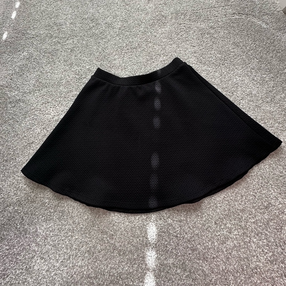 Flared skirt. Used but good condition. Size small. Black. High waisted.